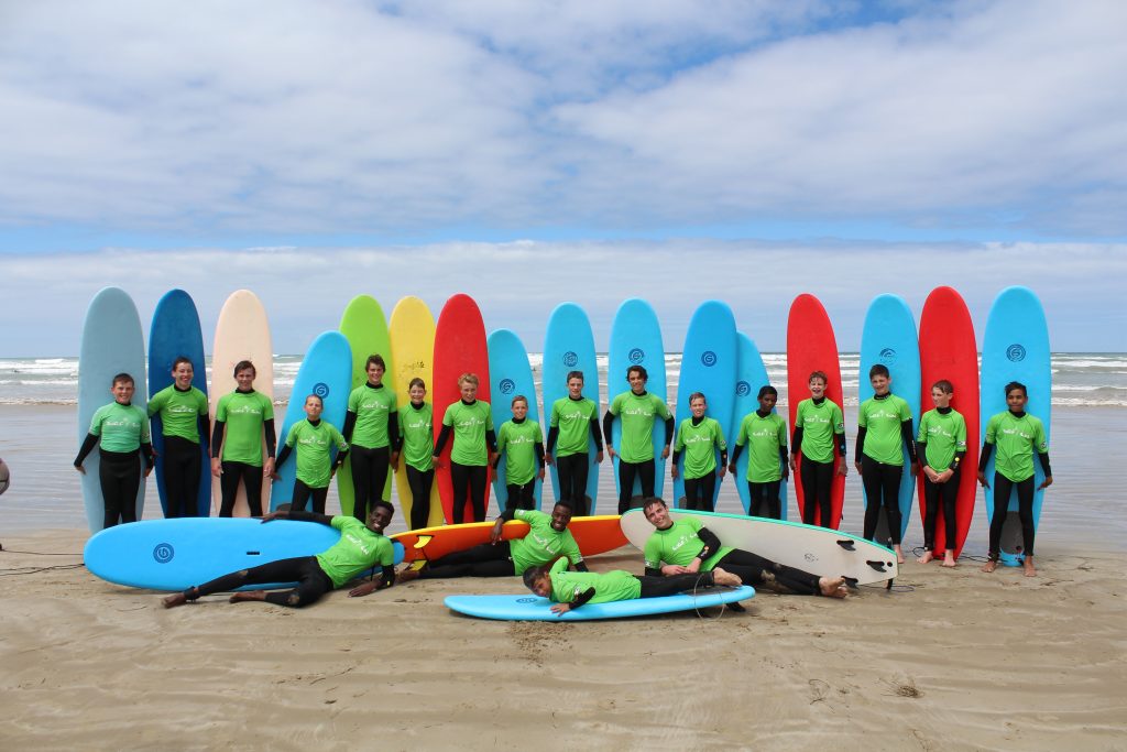 The boarding house goes surfing. 