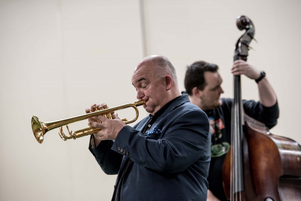 James performs in the Junior School