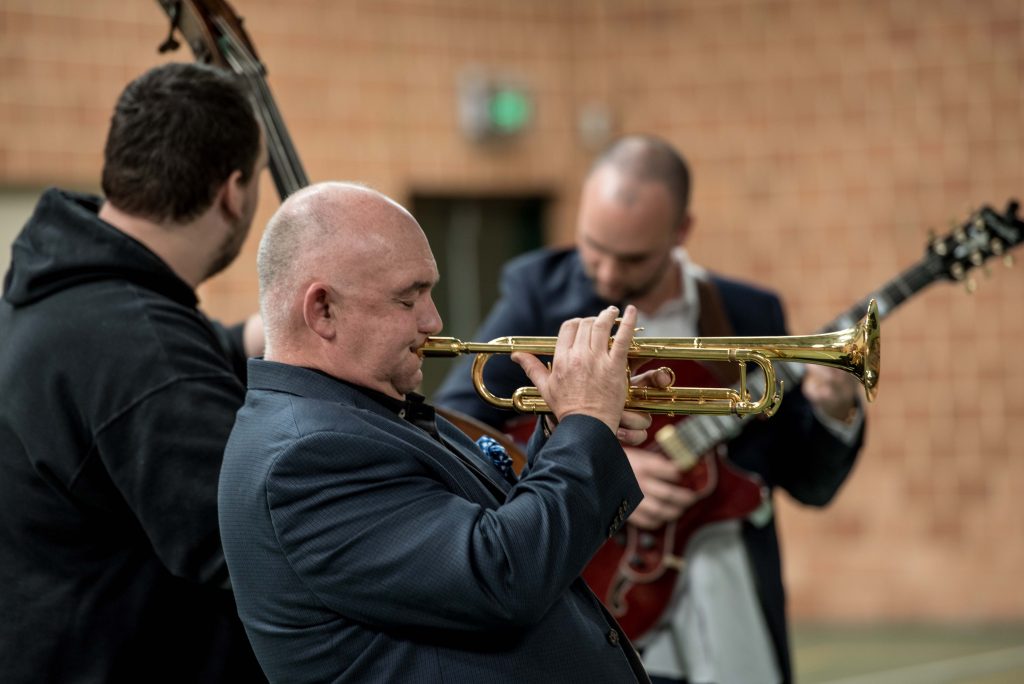 James performs in the Junior School