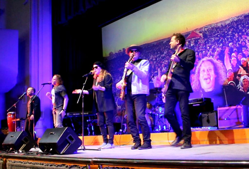 John Brewster and Dave Gleeson from 'The Angels' performing on stage at Battle of the Bands with St Peter's College staff members