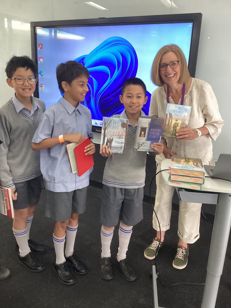 Ethan Lee (Year 5), Sebastian Van Niekerk (Year 5), & Poli Guo (Year 5) with author Katrina Nannestad